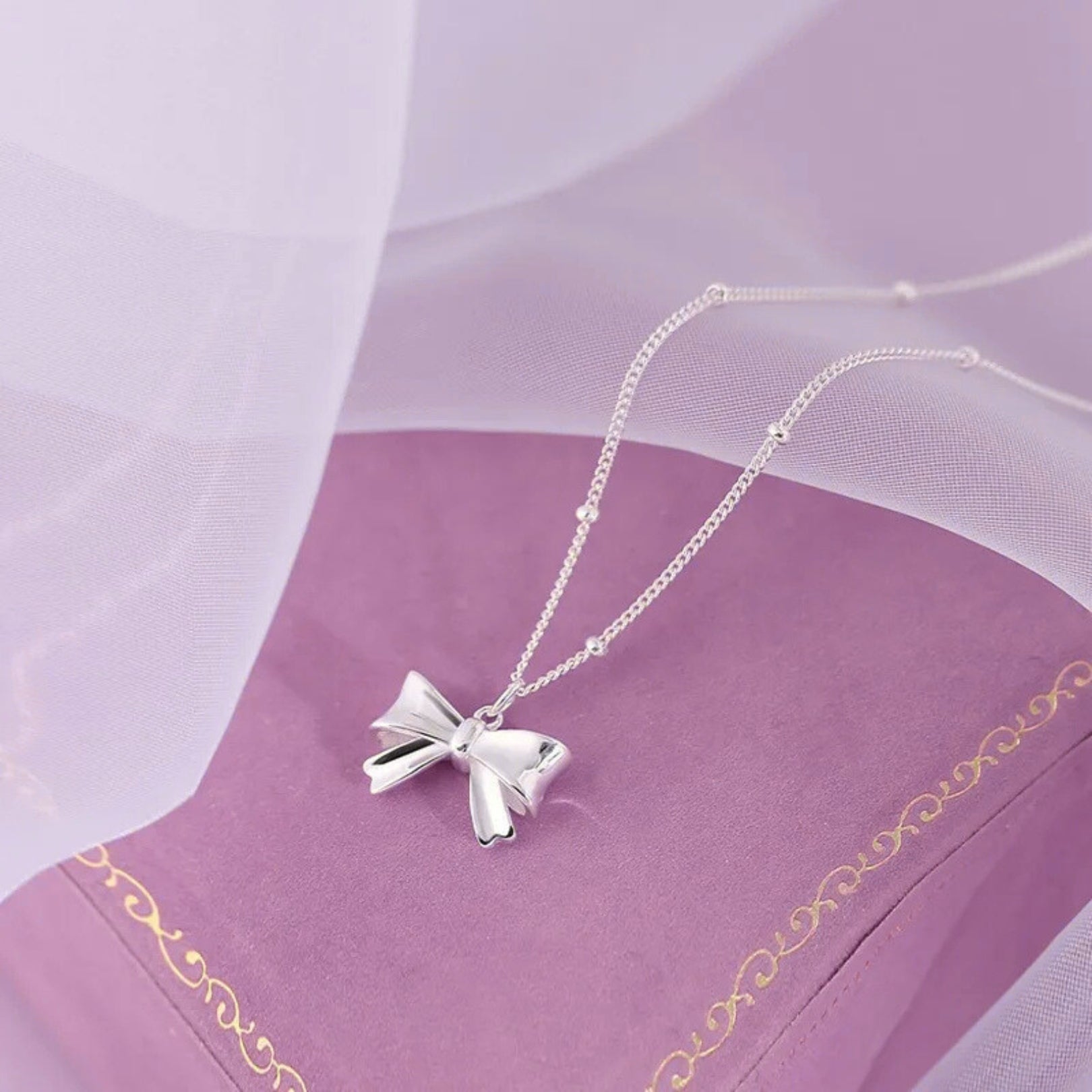 Charming Ribbon Bow Pendant Necklace - Hidden Forever