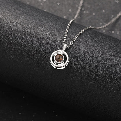 Golden Orbit Projection Necklace - Hidden Forever