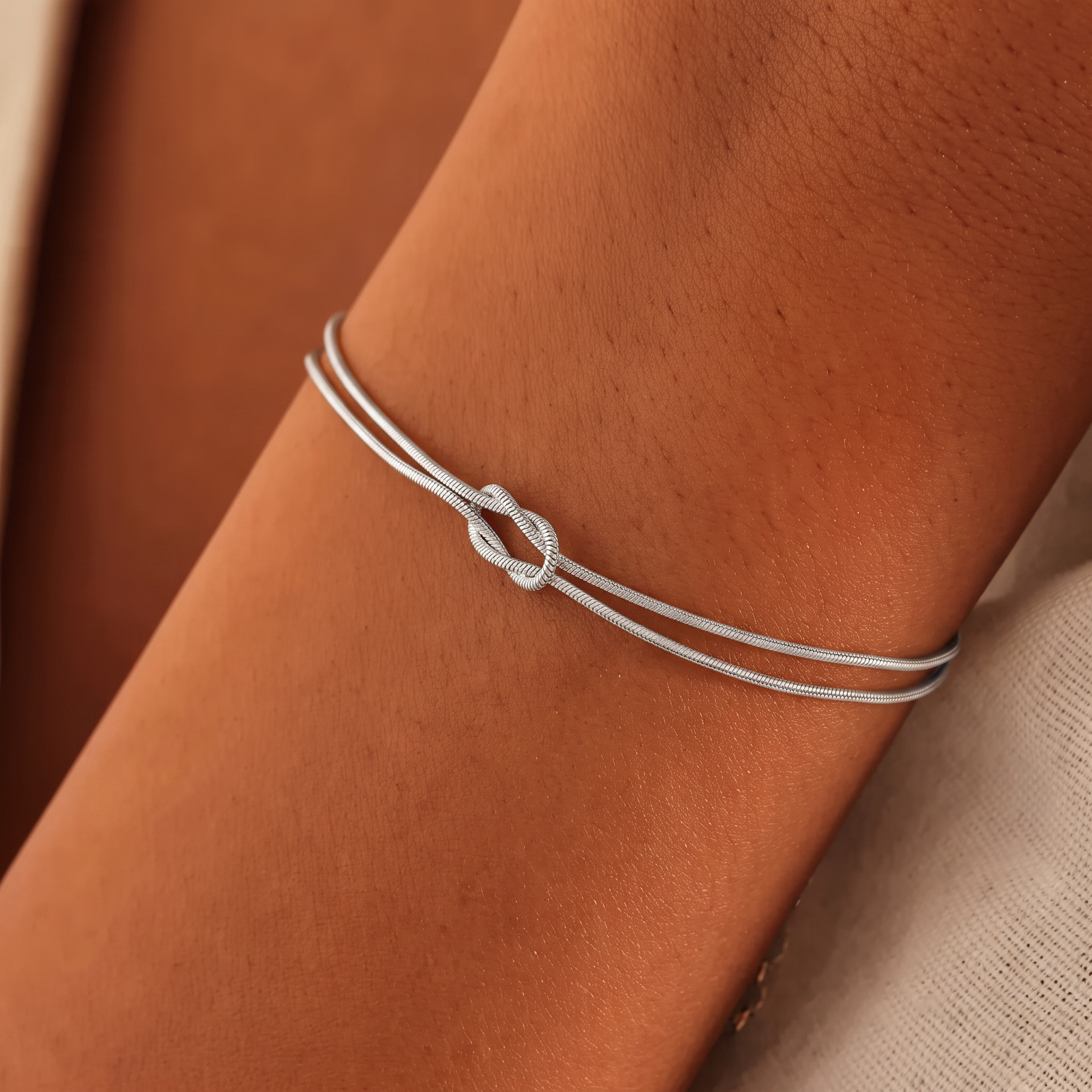 Mother-in-Law & Daughter-in-Law Bond Knot Bracelets in sterling silver worn on the wrist